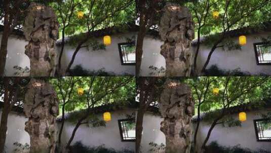 南京夫子庙瞻园庭院里的古风灯笼和桂花树高清在线视频素材下载
