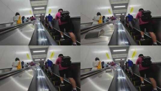 四川成都地铁站电梯上的乘客高清在线视频素材下载