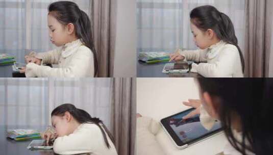 小孩玩iPad平板玩电子游戏沉迷手机游戏高清在线视频素材下载