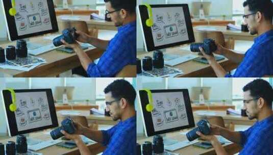 男性平面设计师在办公桌前看着数码相机中的高清在线视频素材下载