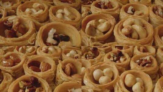 托盘上的果仁蜜饼传统土耳其甜点高清在线视频素材下载
