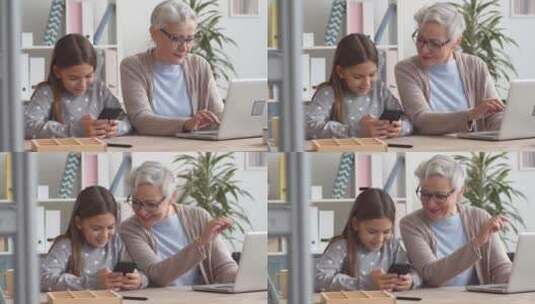 高加索祖母和孙女使用现代技术高清在线视频素材下载