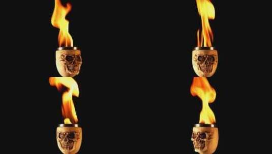 黑色背景带火的骷髅形杯高清在线视频素材下载