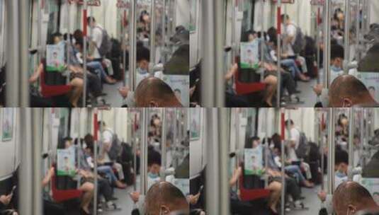 广州地铁 细节  虚化 坐着的人高清在线视频素材下载