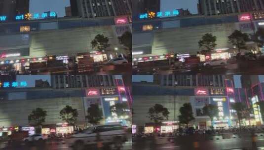 夜晚城市马路商场汽车购物广场高清在线视频素材下载