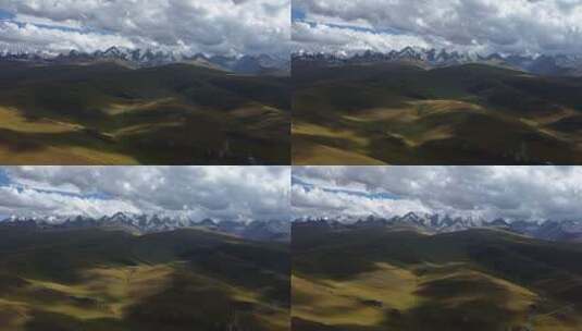 新疆独库公路的草原雪山光影延时高清在线视频素材下载