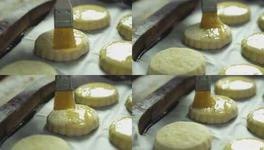 在表面定型月饼上刷蛋液高清在线视频素材下载