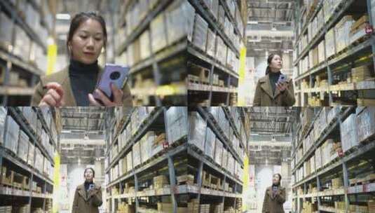 女性拿着手机在超市仓库货架高清在线视频素材下载