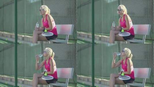 网球运动员在比赛间隙喝水高清在线视频素材下载