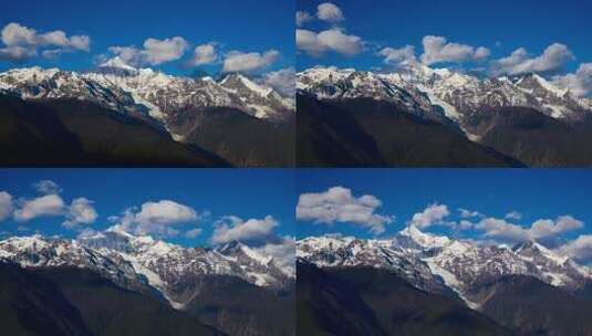蓝天白云下的梅里雪山延时摄影高清在线视频素材下载