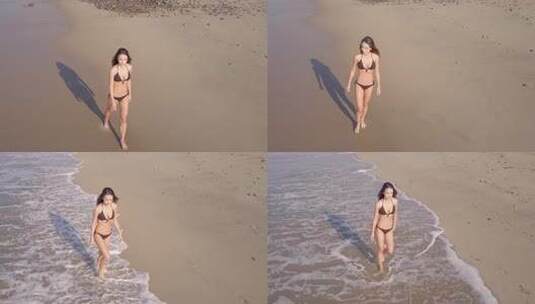 美丽的女人在海滩高清在线视频素材下载