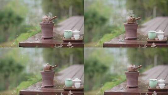 竹林中复古碳炉水壶围炉煮茶高清在线视频素材下载