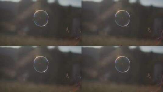 泡沫飘过田野在一片草叶上爆裂视频高清在线视频素材下载