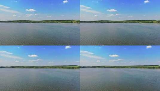 白天的蓝色河流。蓝天下美丽的水景。高清在线视频素材下载