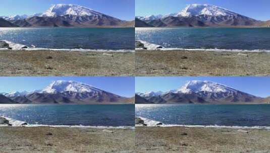 新疆喀什慕士塔格雪山下的喀拉库勒湖高清在线视频素材下载
