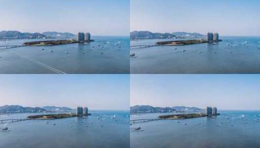 中国海南三亚凤凰岛和游艇城市风光延时摄影高清在线视频素材下载