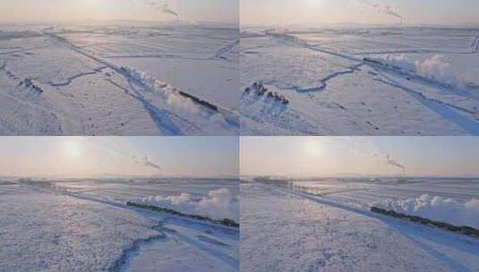 航拍中国东北冬季雪景中的蒸汽机车老火车高清在线视频素材下载