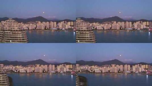 海南三亚三亚湾城市元宵夜景满月高清在线视频素材下载