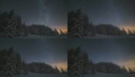 圣诞节冬夜景观与星星天空移动在雪树高清在线视频素材下载