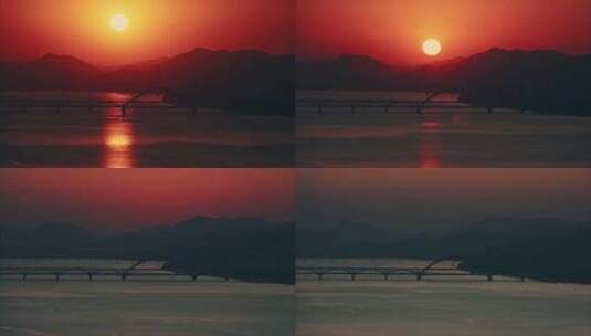 太阳日落江边的群山晚霞高清在线视频素材下载