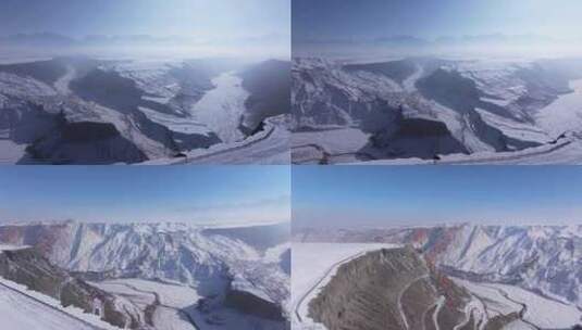 航拍新疆冬季安集海大峡谷雪山山脉高清在线视频素材下载