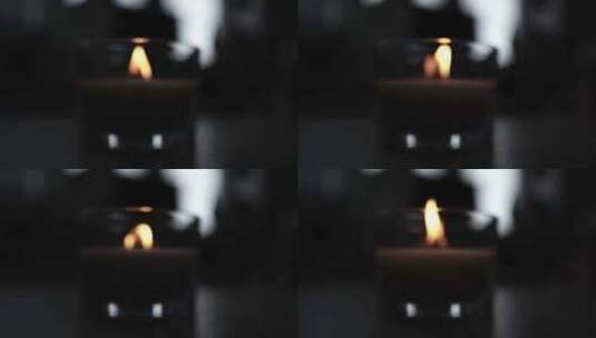 教堂黑暗中的烛光。闪烁的蜡烛。精神氛围高清在线视频素材下载