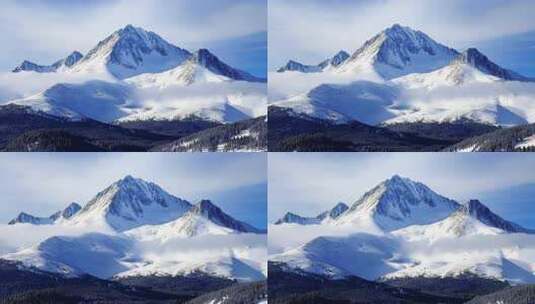 航拍新疆雪山山峰山脉高山冬季旅游自然风景高清在线视频素材下载