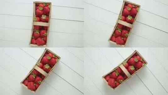 草莓放在白色背景的木箱里高清在线视频素材下载