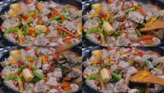 五颜六色的热气腾腾的蔬菜在平底锅上炒制高清在线视频素材下载