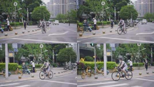 街上骑自行车绿色出行的市民高清在线视频素材下载