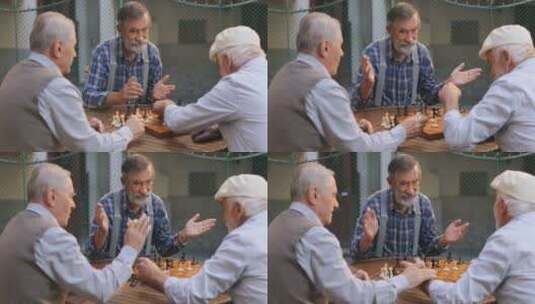 老男性朋友在院子里下棋高清在线视频素材下载