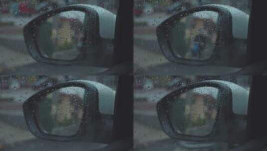 透过布满雨滴的车窗看外面的后视镜高清在线视频素材下载