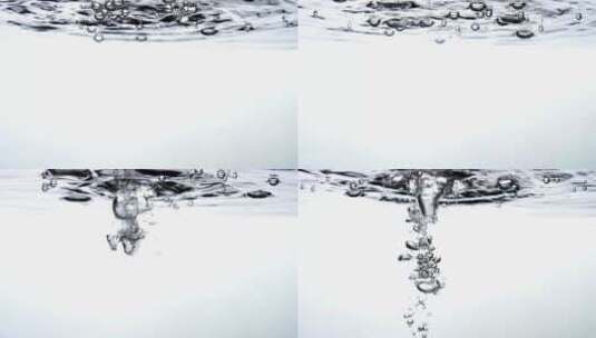 水滴在水容器中产生小气泡的单色场景高清在线视频素材下载