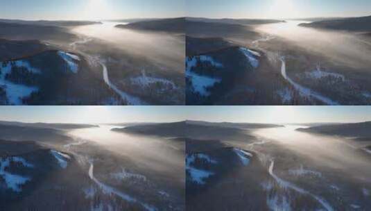 航拍云雾缭绕的冬季山林冰河高清在线视频素材下载