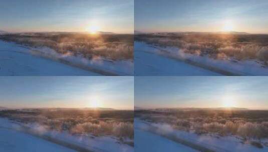 航拍冬季丛林河湾雪景朝阳高清在线视频素材下载