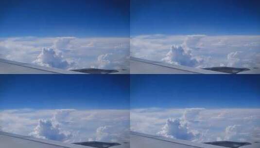 在飞机上看外面的蓝天白云高清在线视频素材下载