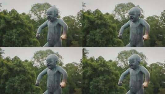 古斯塔雕塑公园里一个生气的小男孩雕塑高清在线视频素材下载