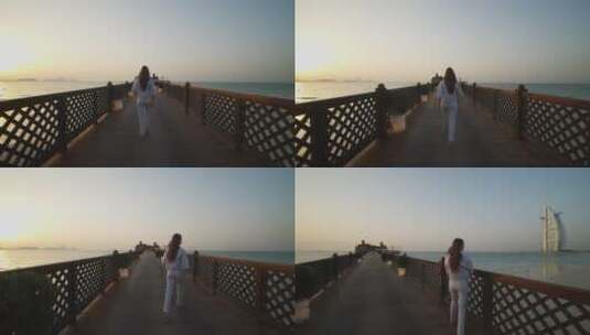 女人在木桥上行走高清在线视频素材下载