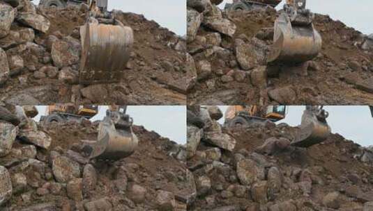 挖掘机在挖石头高清在线视频素材下载