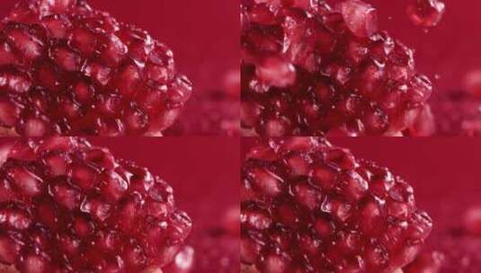红色石榴籽在红背景中下落 4k慢镜头高清在线视频素材下载