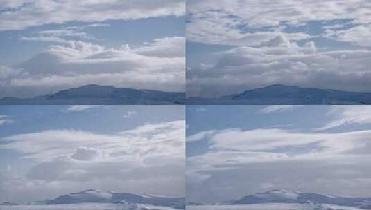 山脉上空的白云延时摄影天线。极地自然美景高清在线视频素材下载