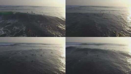 冲浪爱好者在波涛汹涌的大海上冲浪高清在线视频素材下载