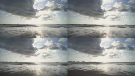 海边蓝天沙滩阳光休闲潮水海边海浪浪花拍打高清在线视频素材下载