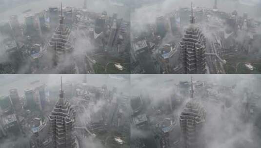 云朵从上海的一座摩天大楼旁掠过高清在线视频素材下载