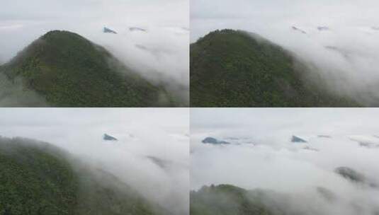 航拍山脉上水汽雾气缭绕仙境高清在线视频素材下载