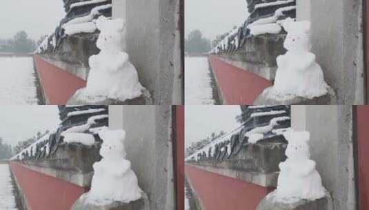 大雪天气中的天坛公园圜丘中的雪人兔子高清在线视频素材下载