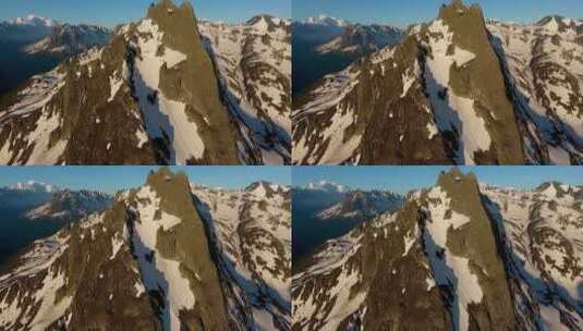 航拍西部高原积雪覆盖的山峰高清在线视频素材下载