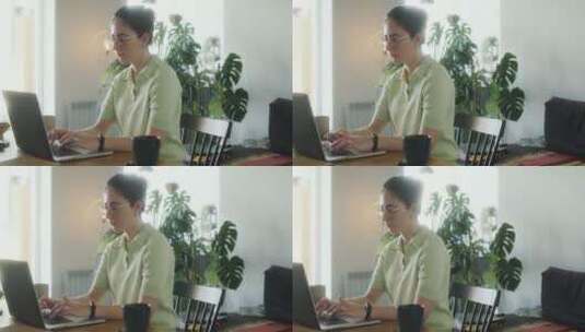 女人使用笔记本电脑打字办公高清在线视频素材下载