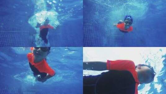 水下拍摄小男孩跳水游泳潜水高清在线视频素材下载