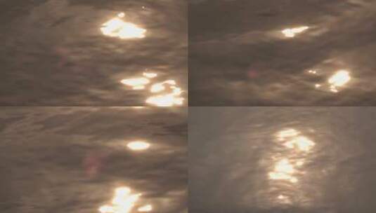 4K水波荡漾中的太阳倒影高清在线视频素材下载